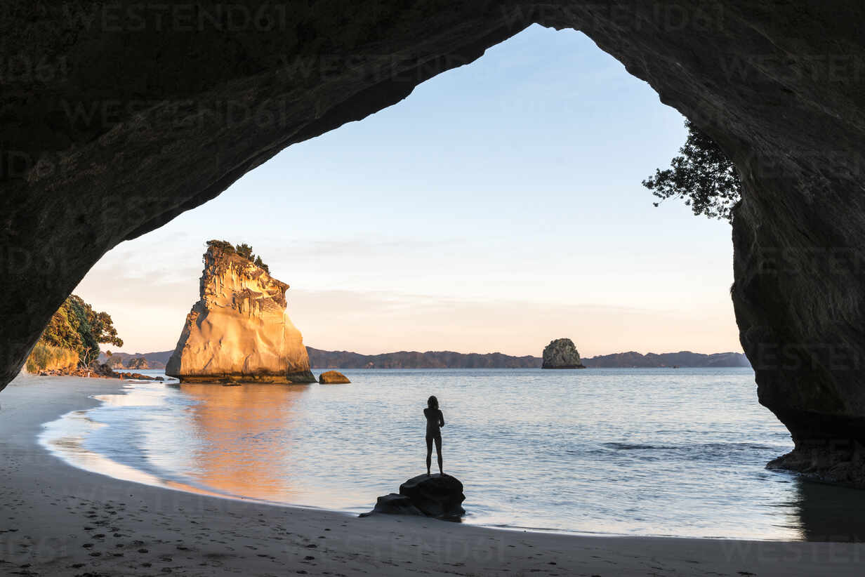 Woman S Silhouette At Cathedral Cove Hahei Waikato Region North Island New Zealand Pacific