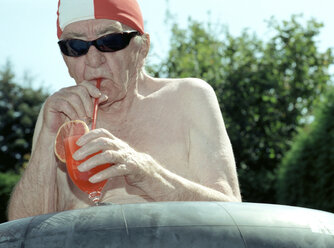 Senior man drinking juice - 00026DK