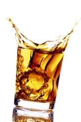 Ice cube falling into whiskey glass - 01490CS-U