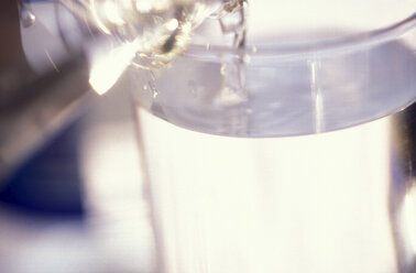 Water being poured into glass, close-up - 00364AS