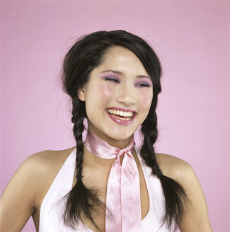 Young woman laughing, close-up - JLF00001