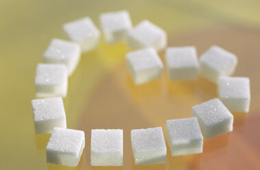 Sugar cubes arranged in shape of heart - ASF01326