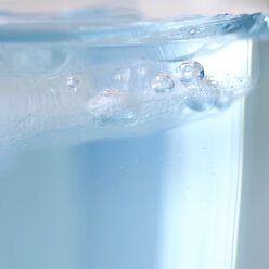 Air bubbles in a water glass, close-up - MNF00068