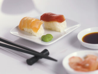 Sushi on plate with chopsticks - THF00024