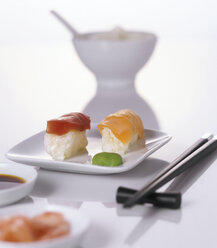 Sushi on plate with chopsticks - THF00016