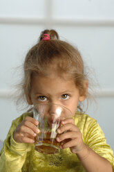 Girl (2-3) drinking juice, close-up - CRF00701