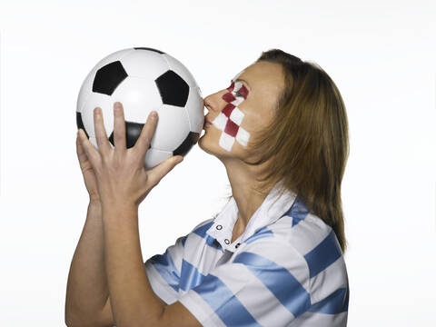 Fußballfan mit kroatischer Flagge im Gesicht, lizenzfreies Stockfoto