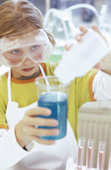 Girl (8-9) in chemical lab - WESTF00011