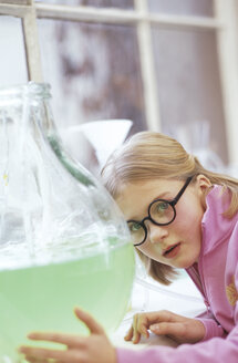 Girl (8-9) in chemical lab - WESTF00007