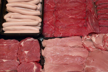 Meat and sausage in a butcher's shop - THF00158