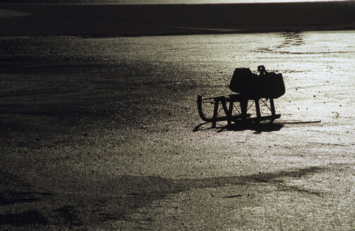 Sledge with bag in winter - MOF00073