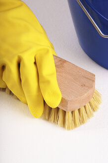 Person scrubbing surface, close-up - 00025LRH-U