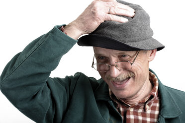 Old man smiling, hand on hat - 03183CS-U