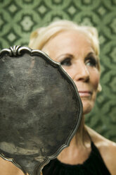 Senior woman with mirror - WEST00350