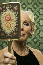 Senior woman with mirror - WEST00345