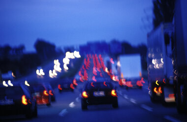 Traffic on street at night, blurred motion - THF00234