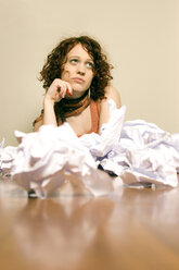 Young woman with crumpled paper - CLF00154