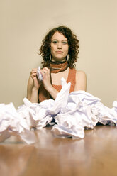 Young woman with crumpled paper - CLF00153