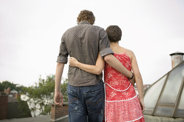 Couple embracing, rear view - WEST01555