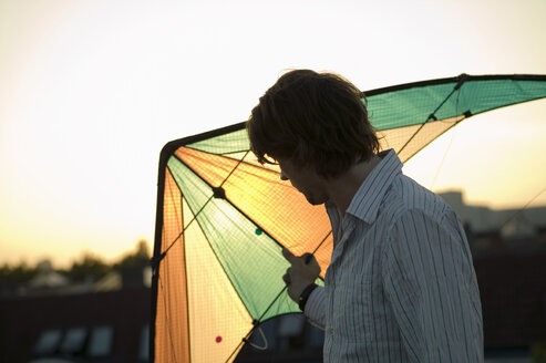 Man holding kite - WEST01509