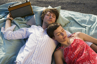 Young couple relaxing on blanket, elevated view - WEST01481