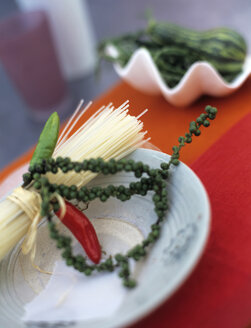 Rice noodles with green chili pepper on plate - HOE00193