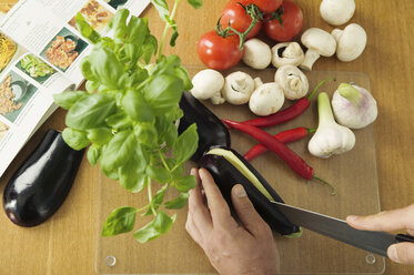 Man cutting vegetables, elevated view - WESTF02199