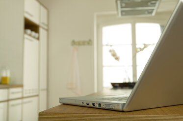 Laptop on kitchen table - WESTF02145