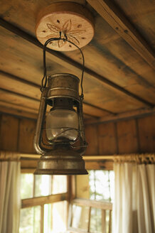 Oil lamp hanging on wooden ceiling - BABF00045