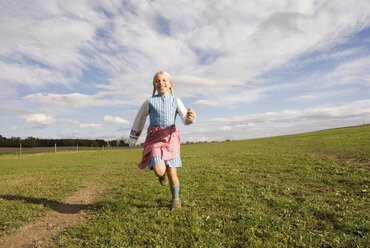 Girl running on meadow - WESTF02952