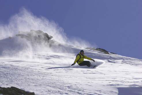 Switzerland, St. Moritz, person snowbording - FFF00694