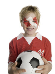 Junge (10-12) hält Fußball - LMF00507