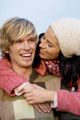 Woman embracing man, smiling, close-up - LDF00388