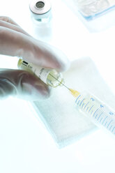 Medicine is drawn into a syringe, close-up - THF00430