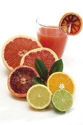 Various citrus fruits by glass of juice - 05693CS-U