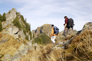 Couple hiking in mountains - WESTF04227