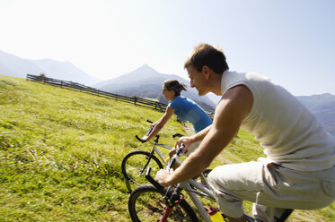 Couple riding bicycle - WESTF04186