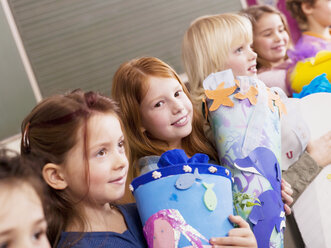 Pupils holding schoolcone - WESTF04441