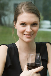 Woman drinking red wine - NHF00476