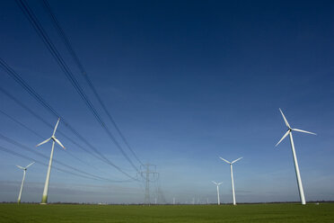 Germany, Wind wheels in field - GNF00921