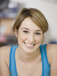 Young woman smiling, portrait - KMF00925