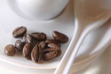 Saucer with coffee beans, close-up - ASF03191