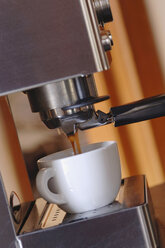 Espresso machine with mug, close-up - ASF03176