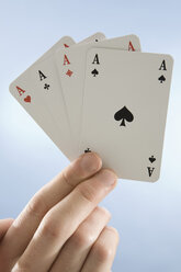 Hand holding aces, close-up - CLF00436