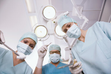 Surgery team in the operating room - WESTF05619