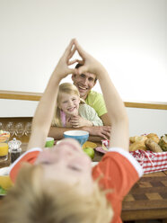 Father and children at breakfast table - WESTF05996