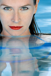 Woman relaxing in pool - MAEF00414