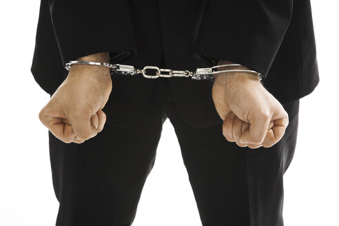 Man wearing handcuffs, close-up - PKF00177