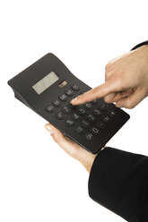 Man using calculator, close-up - PKF00158