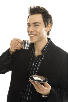 Young man holding coffe cup, close-up - PKF00150